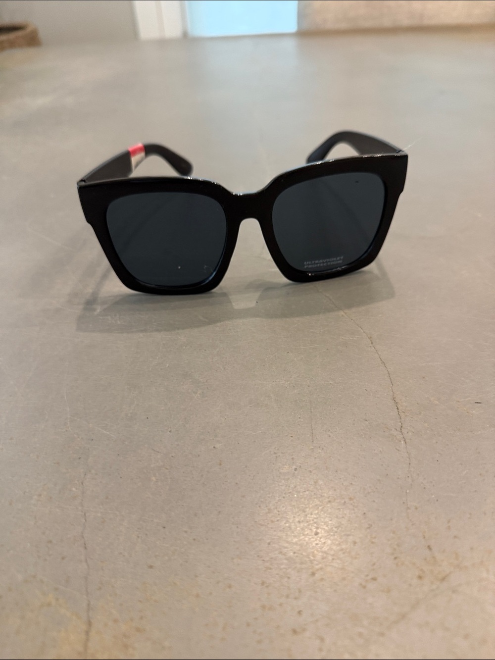 Target Black Square Women’s Sunglasses with Dark Lenses and Pink Temple Accent